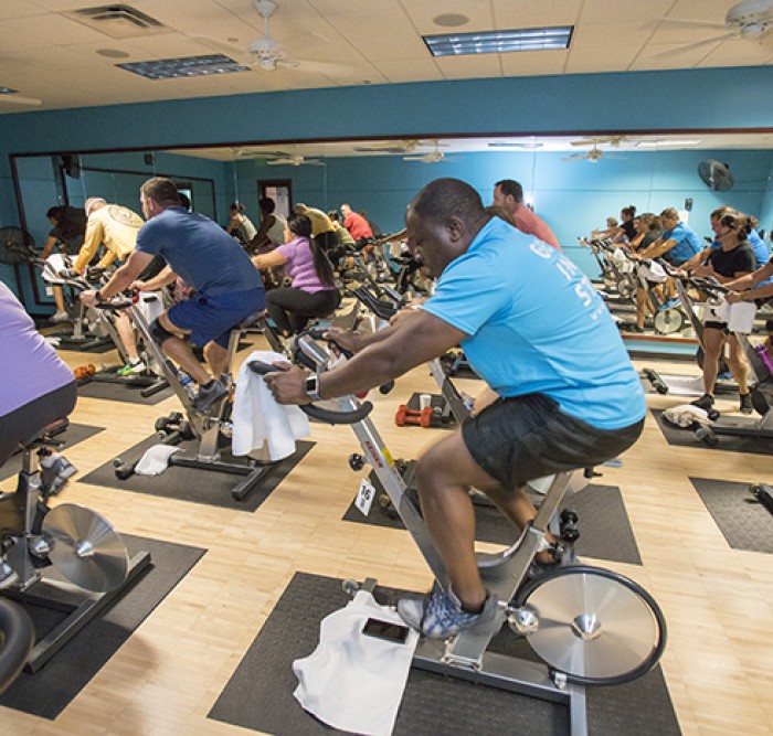 Valero employees enjoying spin class