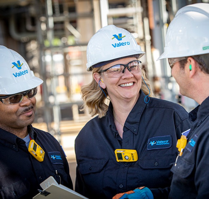 Three Valero employees stand together at the Memphis refinery.
