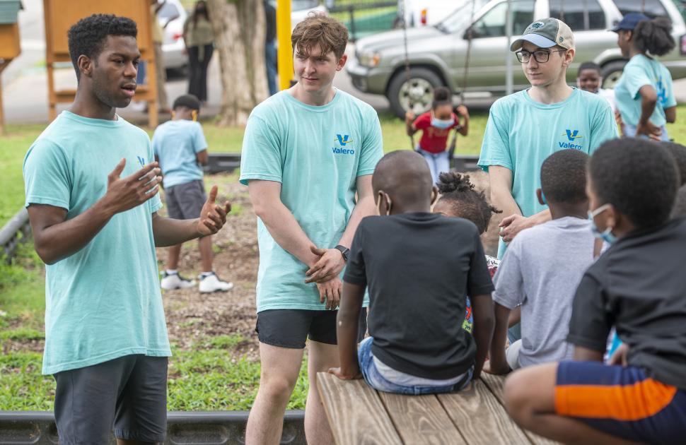 Interns at the Memphis Refinery talk to local children about their jobs