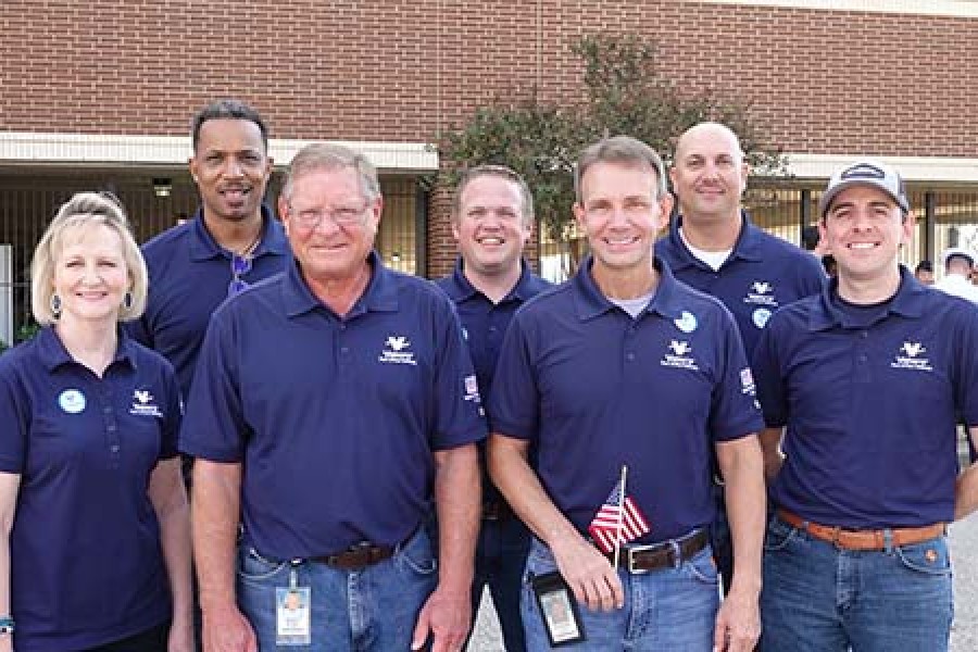 Valero veterans at the Port Arthur refinery stand together during Veterans Day 2022