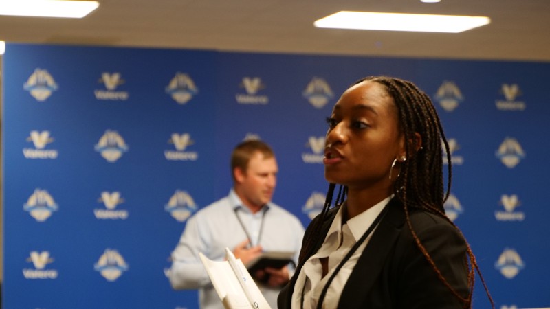 A student practices interviewing at Valero's Freshman Engineering Summit.